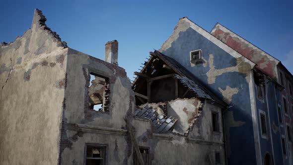 Destroyed Building and Pile of Debris After War alt