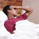 Headache Tense African Man with Stress Relaxing in Bed - VideoHive Item for Sale