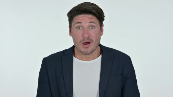 Middle Aged Businessman with Shocked Expression White Background alt