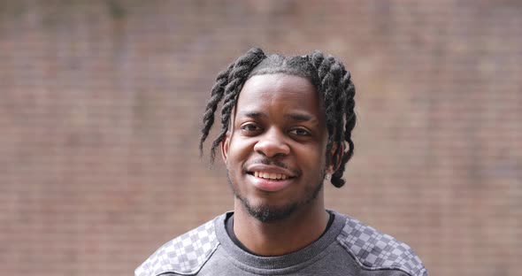 Slow motion shot of smiling man alt