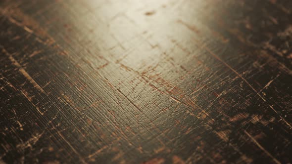 Old, grungy dark painted wooden board or plank. Seamless looping animation.