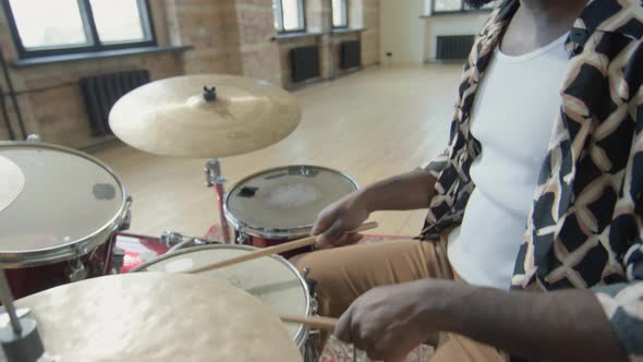 Black Musician Playing Drumset alt