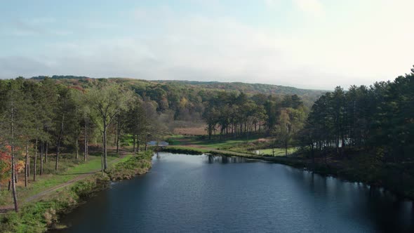 Aerial shot of a river on a sunny day in the Midwest United States alt