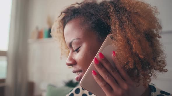 Close Up of African American Woman Having Boring Conversation and Rolling Eyes alt
