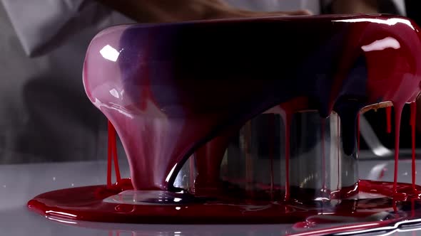 Red and Purple Mirror Icing on a Round Frozen Mousse Cake alt