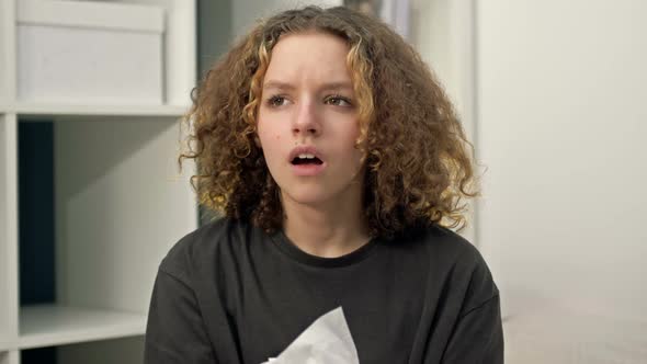 Portrait of a Teenage Girl Who Sneezes
