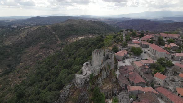 Aerial approach of Sortelha medieval castle, Portugal