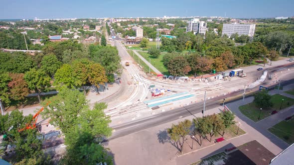 Road Construction Site with Tram Tracks Repair and Maintenance Aerial Timelapse alt