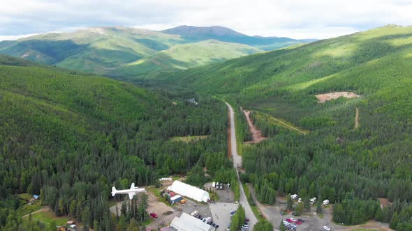 4K Drone Video of Mountains at Entrance of Chena Hot Springs Resort near Fairbanks, Alaska in Summer alt