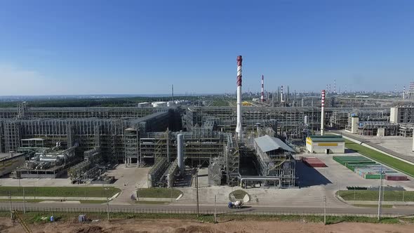 An Aerial View of a Huge Oil Refining Complex on a Sunny Day alt
