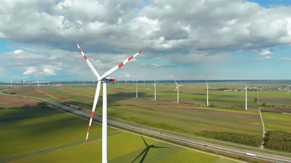 Aerial View of Wind Turbines Farm and Agricultural Fields. Austria. alt