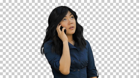 Businesswoman in blue suit talking on the cell phone, Alpha Channel
