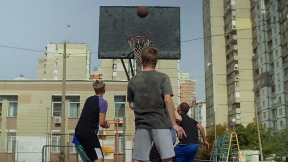 Streetball Player Taking a Free Throw on Court alt