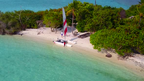 Daytime abstract of seashore beach by blue sea and sand background near sandbank alt