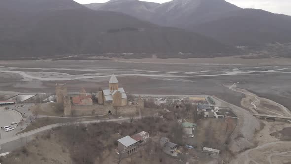 Aerial view of old Ananuri Fortress with two churches and picturesque view on river. Georgia 2021 alt