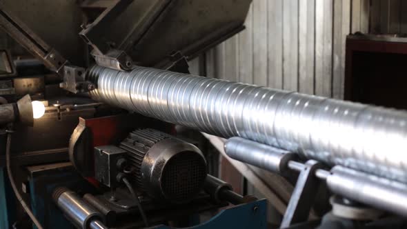 The Machine Produces a Stainless Steel Ventilation Pipe