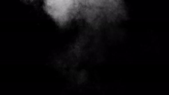 Soft fog in slow motion on dark background