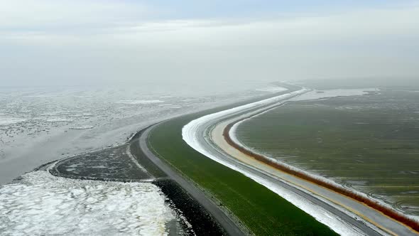 Fields and North Sea in Winter, Nes, Friesland, Netherlands