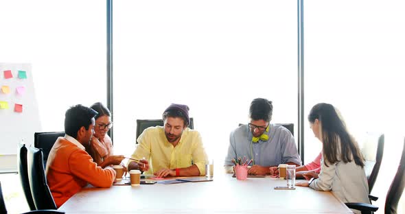 Businesspeople having a discussion alt