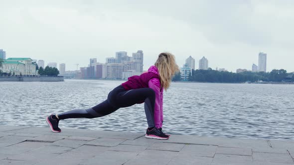 Unrecognizable Girl Doing Warmup Before Training at Street alt