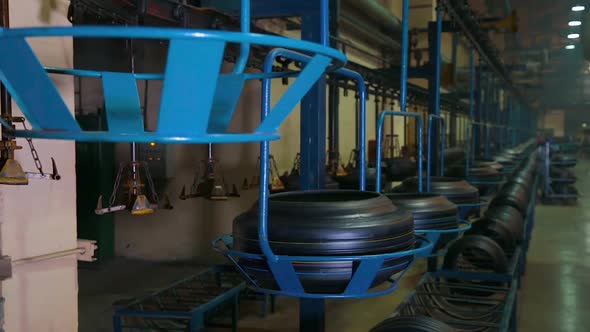 Tire Moves on the Conveyor at Factory