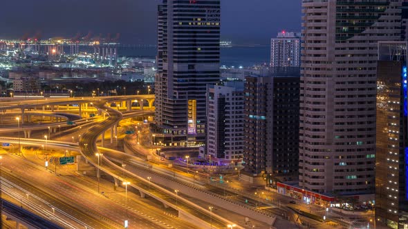 Dubai Marina Skyscrapers Aerial Top View Before Sunrise From JLT in Dubai Night to Day Timelapse UAE alt