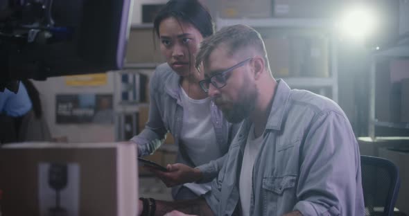 Young Man Working in a Distribution Center alt