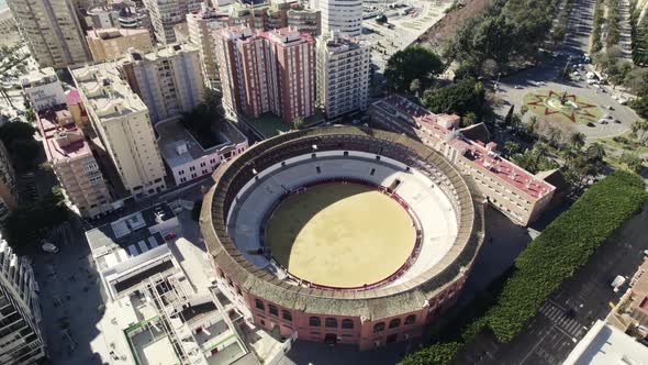 Topdown upwards view Malaga bullring, La malagueta surrounded by residential buildings, Andalusia