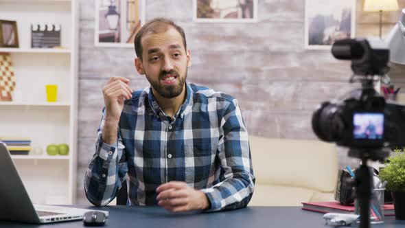 Angry Young Vlogger While Recording a New Podcast alt