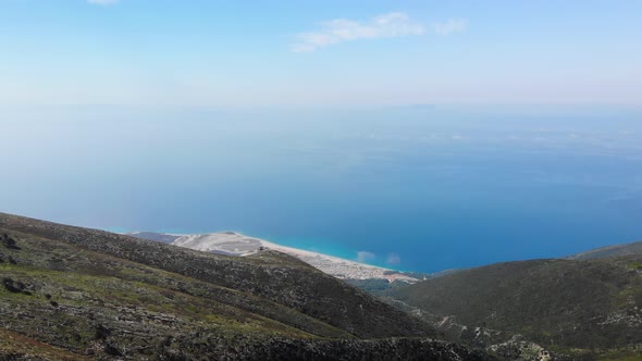 Aerial View From Llogara Pass to Albanian Riviera Beach Clouds and Ionian Sea Coastline alt