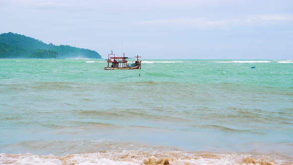 Fishing Boat in The Open Sea, Strong Waves and A Wind Storm alt