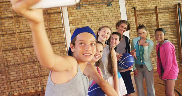 High school kids taking a selfie alt