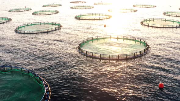 Sunset over sea fish farm in mediterranean sea alt