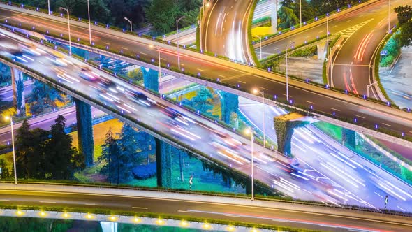 Time lapse of the busy interchange traffic in city alt