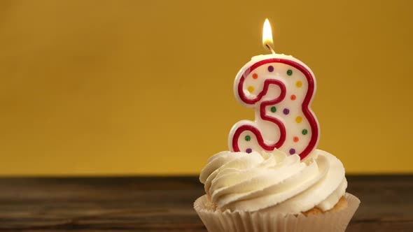 Cupcake With Number 3 Candle