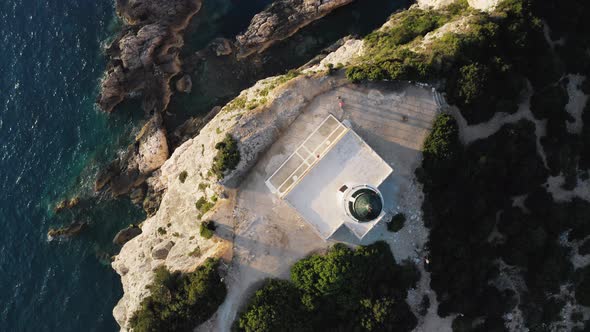 Top down view of Cape of Ducato, famous lighthouse of Greek island Lefkada. alt
