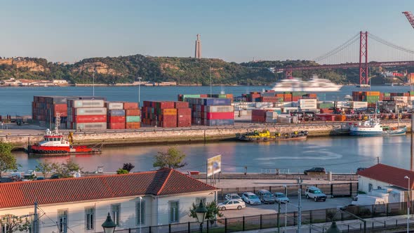Skyline Over Lisbon Commercial Port Timelapse 25Th April Bridge Containers on Pier with Freight alt