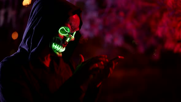 Using Smartphone Anonymously Internet Fraudster is Wagging Finger Warning and Caution alt