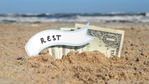 Paper Bills One Dollar and Small Stick Paper Speech Bubble with Word Rest alt