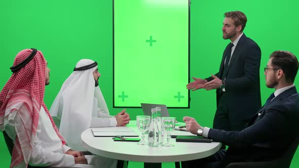 International Business Meeting a Man Speaker Communicate with a Arab Business Partners in a White alt