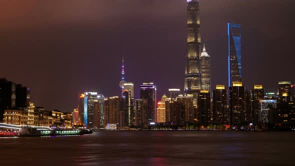 Shanghai River Urban Cityscape Aerial Skyline Panorama Timelapse at Night Zoom Out alt