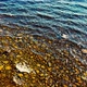 Aerial view water with stones. Top fly over the lake - VideoHive Item for Sale