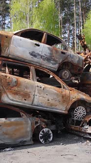 Vertical Video of Destroyed Cars in the City of Irpin Ukraine alt