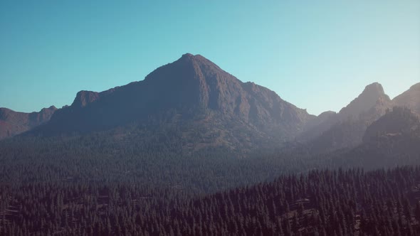Landscape View of the Mountain Range with Trees in the Fall alt
