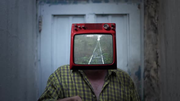 TV Man with Railroad Tracks. alt