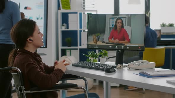 Invalid Disabled Paralysed Businesswoman Talking in Video Conference alt