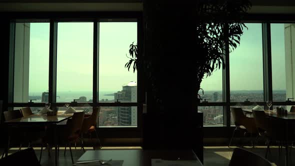 City View in the Glass of a Luxury Restaurant 4K alt