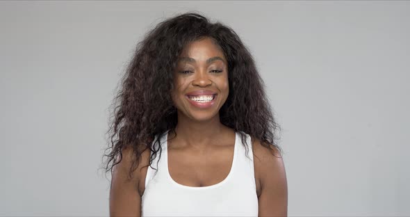 Happy Black Woman Laughing for Camera