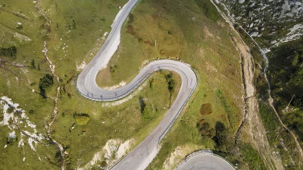 Top Down Aerial View of Curvy Road Pass in Val Gardena Valley, Northern Italy alt