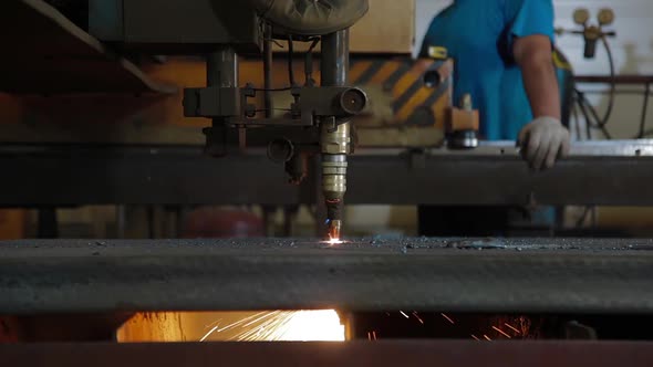 Plasma Cutting of Metal with a Cnc. A Plasma Cutter Cuts a Workpiece From a Sheet of Metal. Laser alt